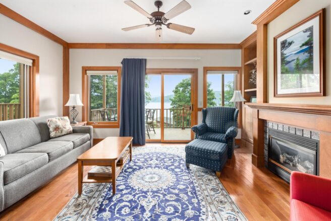 Lake George lodging with wood floors and a fireplace.