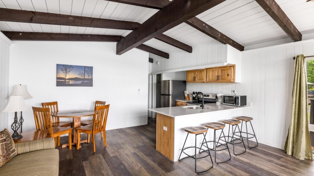 A cabin with wood beams in Lake George vacation lodging.