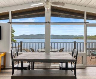 A Lake George resort with a dining room overlooking the lake.