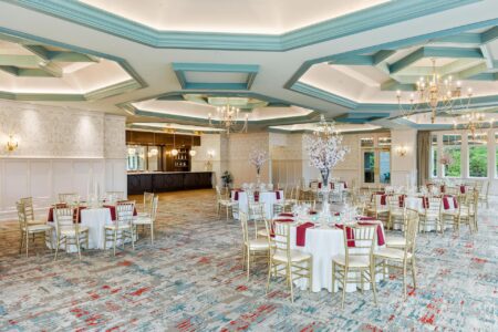 A banquet room set up with tables and chairs at Erlowest, one of the best hotels in Lake George.