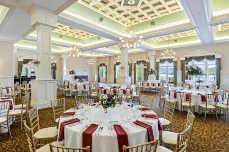 A Lake George resort with a large ballroom set up for a wedding.