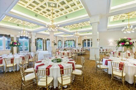 A lavish ballroom adorned for a wedding reception at Erlowest, Lake George lodging.