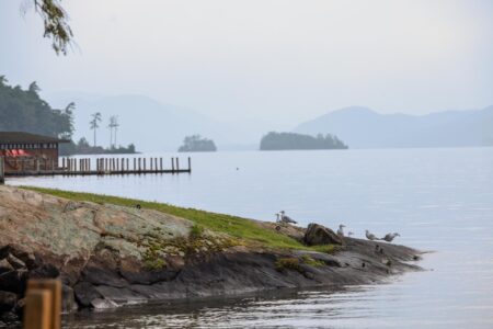 A lake with a dock for Lake George vacation.