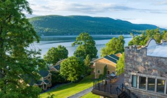 A breathtaking view of Lake George and the surrounding mountains from a top-tier hotel.