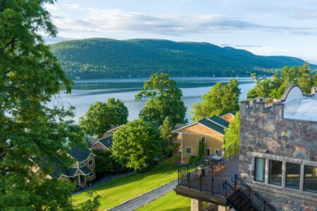 A breathtaking view of Lake George and the surrounding mountains from a top-tier hotel.