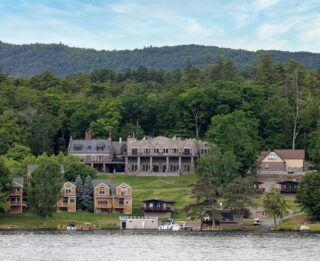 Lake George lodging: A large house sits on the shore of Lake George.