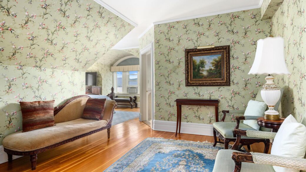 A Lake George vacation home with floral wallpaper.