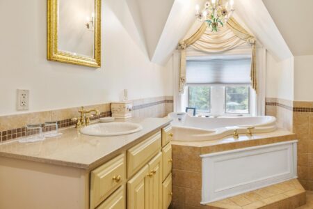 Lake George lodging with a jacuzzi tub and a window