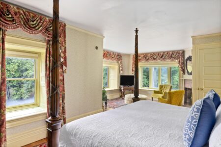 Lake George hotel with a four poster bed and window