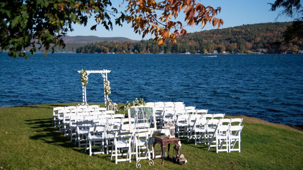 A wedding ceremony set up on a lawn near Erlowest, a Lake George lodging.