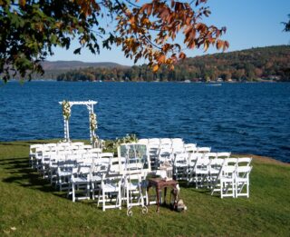 A wedding ceremony set up on a lawn near Erlowest, a Lake George lodging.