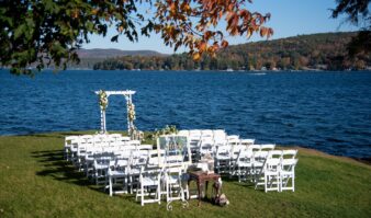 A wedding ceremony set up on a lawn near Erlowest, a Lake George lodging.