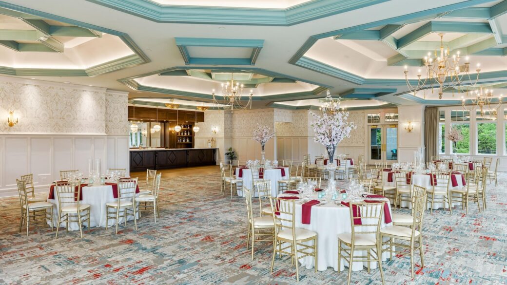 A banquet room set up with tables and chairs.